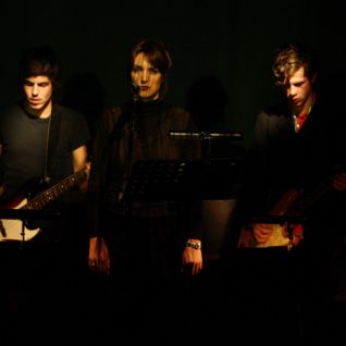 Trio d'artistes, photo clair obscur